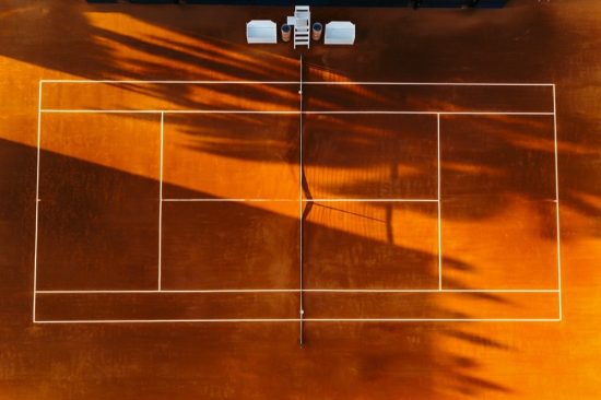 تحتوي هذه الصورة على سمة alt فارغة؛ اسم الملف هو Tennis-Court_Above-550x366.jpg